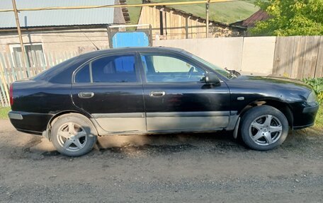 Mitsubishi Carisma I, 2003 год, 165 000 рублей, 2 фотография