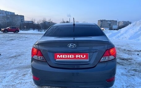 Hyundai Solaris II рестайлинг, 2011 год, 650 000 рублей, 14 фотография