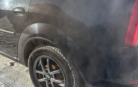 Renault Logan I, 2011 год, 390 000 рублей, 13 фотография