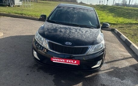 KIA Rio III рестайлинг, 2013 год, 1 050 000 рублей, 13 фотография