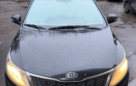 KIA Rio III рестайлинг, 2012 год, 675 000 рублей, 16 фотография