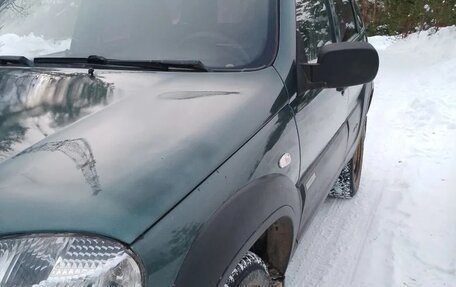 Chevrolet Niva I рестайлинг, 2012 год, 410 000 рублей, 3 фотография