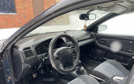 Mazda 323, 1998 год, 145 000 рублей, 11 фотография