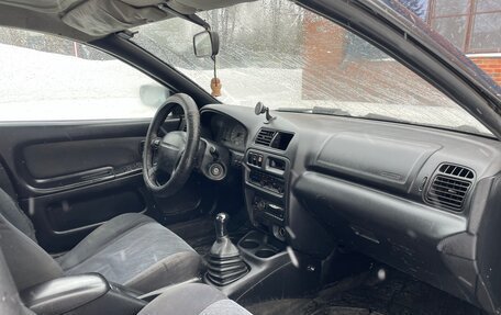 Mazda 323, 1998 год, 145 000 рублей, 13 фотография