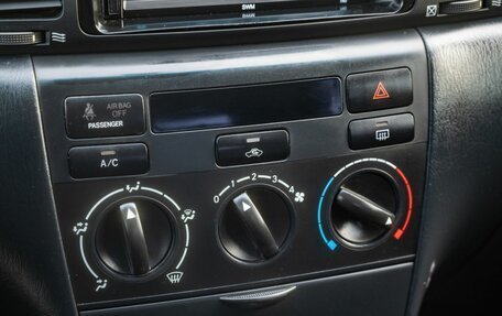 Toyota Corolla, 2005 год, 650 000 рублей, 15 фотография