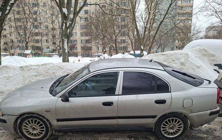 Mitsubishi Carisma I, 2003 год, 230 000 рублей, 1 фотография