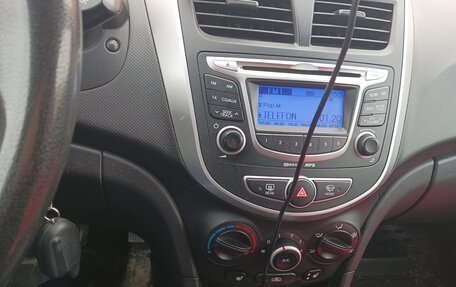 Hyundai Solaris II рестайлинг, 2011 год, 790 000 рублей, 14 фотография