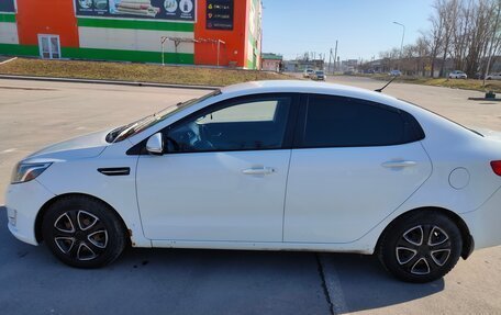 KIA Rio III рестайлинг, 2013 год, 750 000 рублей, 2 фотография