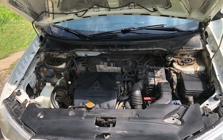 Mitsubishi ASX I рестайлинг, 2012 год, 750 000 рублей, 33 фотография