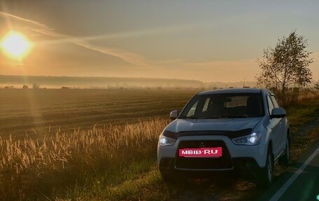 Mitsubishi ASX I рестайлинг, 2012 год, 750 000 рублей, 39 фотография