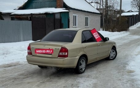 Mazda Protege, 2001 год, 260 000 рублей, 2 фотография