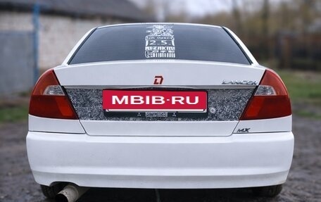 Mitsubishi Lancer VII, 1999 год, 275 000 рублей, 4 фотография