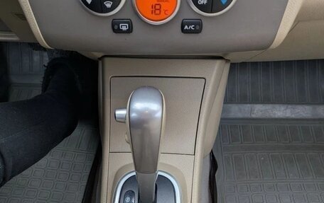 Nissan Tiida, 2011 год, 810 000 рублей, 14 фотография