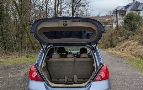 Nissan Tiida, 2011 год, 810 000 рублей, 28 фотография