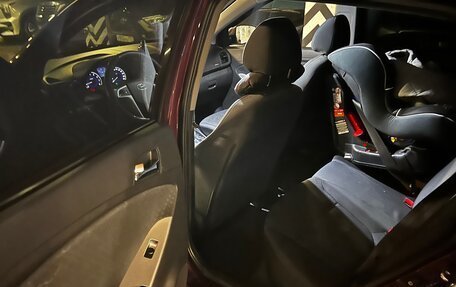 Hyundai Solaris II рестайлинг, 2012 год, 17 фотография