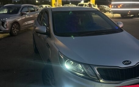 KIA Rio III рестайлинг, 2011 год, 750 000 рублей, 16 фотография