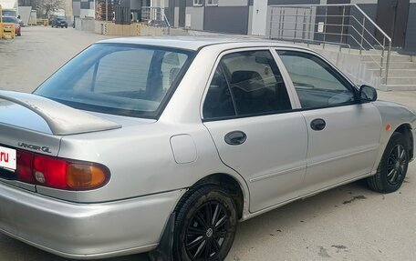 Mitsubishi Lancer VII, 1992 год, 175 000 рублей, 9 фотография