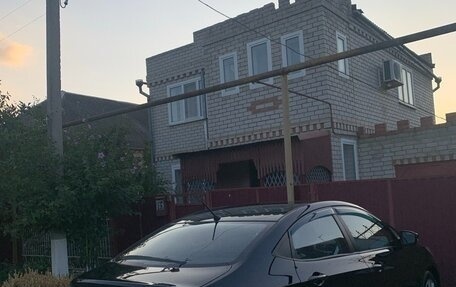 Hyundai Solaris II рестайлинг, 2011 год, 750 000 рублей, 14 фотография