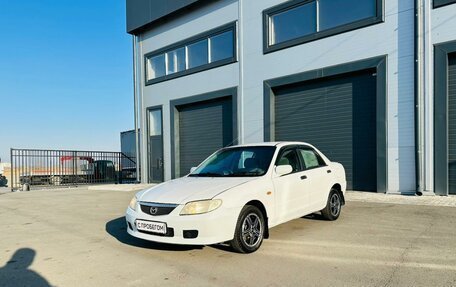 Mazda Familia, 2002 год, 299 000 рублей, 2 фотография