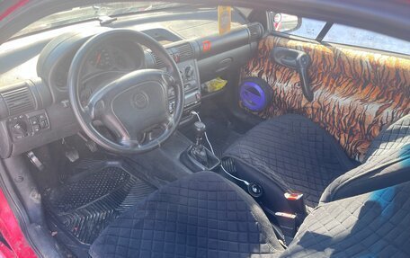 Opel Tigra, 1994 год, 200 000 рублей, 11 фотография