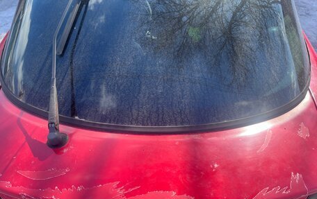 Opel Tigra, 1994 год, 200 000 рублей, 10 фотография