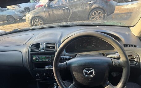 Mazda Familia, 2000 год, 305 000 рублей, 9 фотография