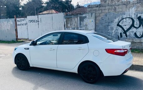 KIA Rio III рестайлинг, 2013 год, 845 000 рублей, 19 фотография