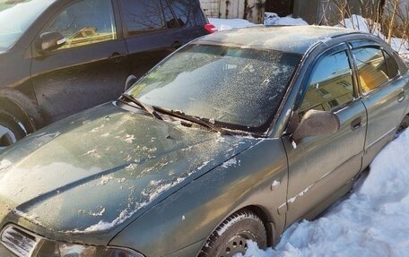 Mitsubishi Carisma I, 2002 год, 235 000 рублей, 1 фотография