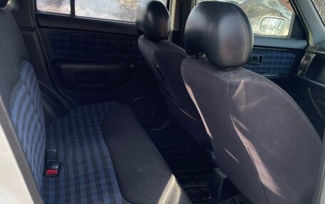 Nissan Cube II, 1999 год, 210 000 рублей, 24 фотография