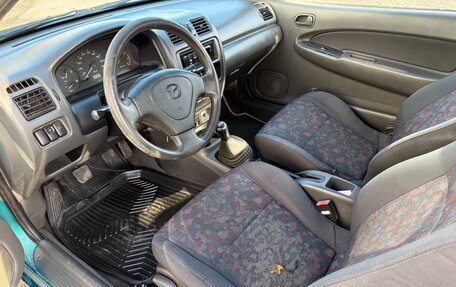 Mazda 323, 1996 год, 155 000 рублей, 10 фотография