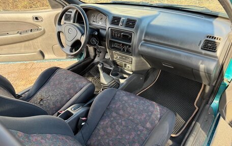 Mazda 323, 1996 год, 155 000 рублей, 13 фотография