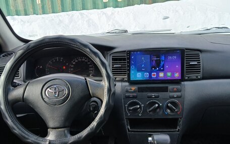 Toyota Corolla, 2004 год, 600 000 рублей, 13 фотография