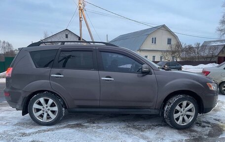 Mitsubishi Outlander III рестайлинг 3, 2010 год, 1 050 000 рублей, 2 фотография