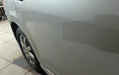 Nissan Tiida, 2010 год, 730 000 рублей, 13 фотография