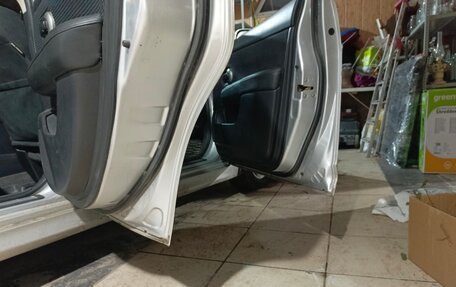 Nissan Tiida, 2010 год, 730 000 рублей, 9 фотография