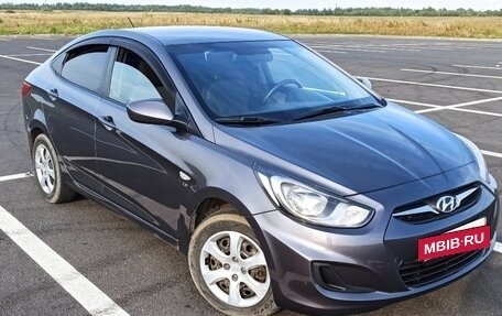 Hyundai Solaris II рестайлинг, 2011 год, 650 000 рублей, 3 фотография