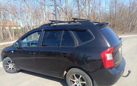 KIA Carens III (RP), 2011 год, 820 000 рублей, 1 фотография