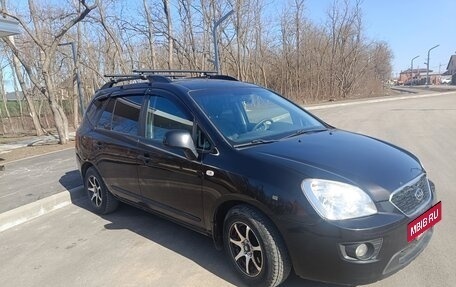 KIA Carens III (RP), 2011 год, 820 000 рублей, 2 фотография