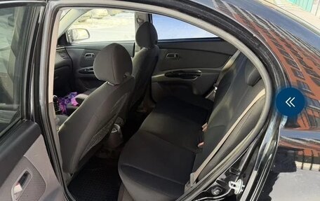 KIA Rio II, 2011 год, 13 фотография