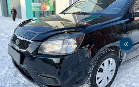 KIA Rio II, 2011 год, 12 фотография
