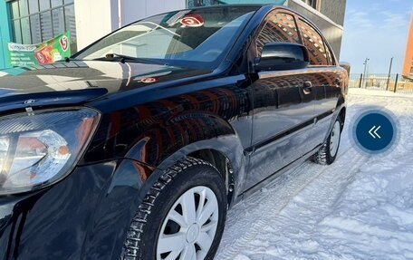 KIA Rio II, 2011 год, 11 фотография