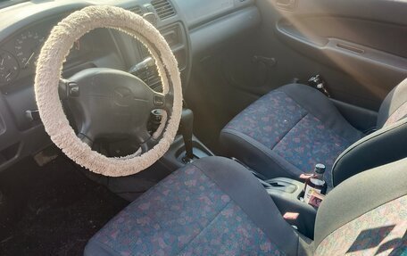 Mazda 323, 1999 год, 320 000 рублей, 10 фотография