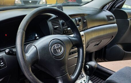 Toyota Corolla, 2004 год, 670 000 рублей, 7 фотография