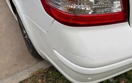 Nissan Tiida, 2012 год, 850 000 рублей, 8 фотография