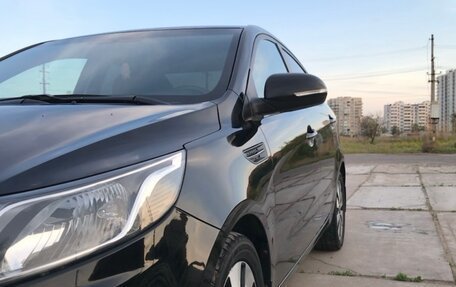 KIA Rio III рестайлинг, 2013 год, 1 000 000 рублей, 3 фотография