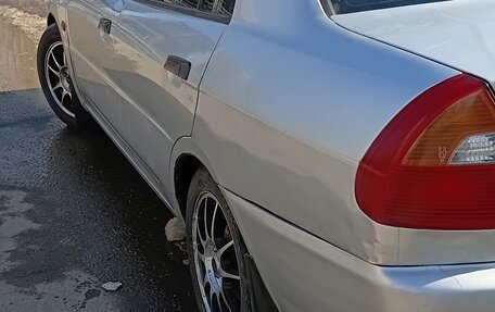 Mitsubishi Lancer VII, 2000 год, 157 000 рублей, 4 фотография