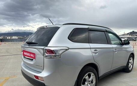 Mitsubishi Outlander III рестайлинг 3, 2012 год, 1 300 000 рублей, 11 фотография
