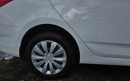 Hyundai Solaris II рестайлинг, 2011 год, 600 000 рублей, 23 фотография