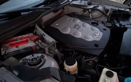 Infiniti FX I, 2007 год, 750 000 рублей, 39 фотография