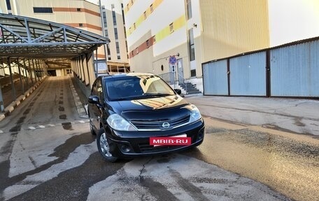 Nissan Tiida, 2010 год, 770 000 рублей, 30 фотография